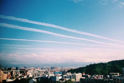 Cityscape against blue sky