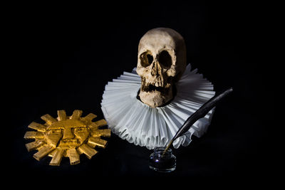 Close-up of human skeleton against black background