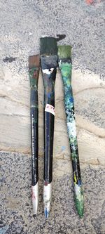 High angle view of paintbrushes in container