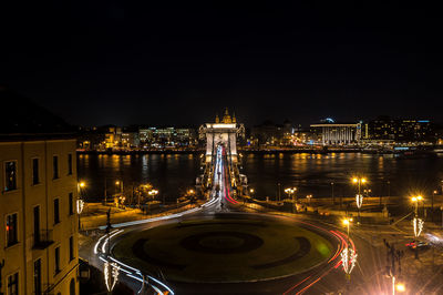 Illuminated buildings in city at night