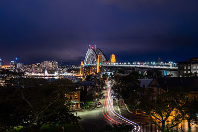 Illuminated buildings in city at night