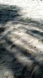 Footprints on sandy beach