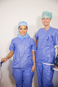 Smiling nurses working together