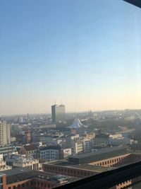 High angle view of buildings against clear sky