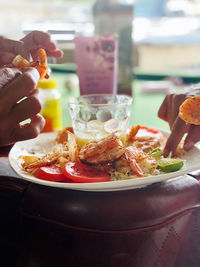 Close-up of hand holding food