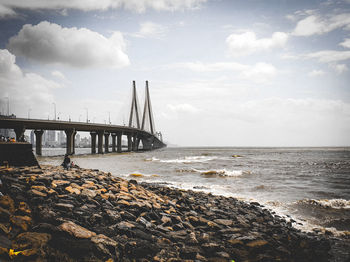 View of bridge over sea against sky