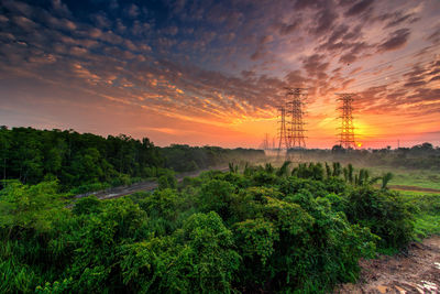 Scenic view of landscape against sky during sunset