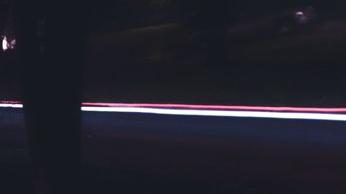 Light trails on road at night