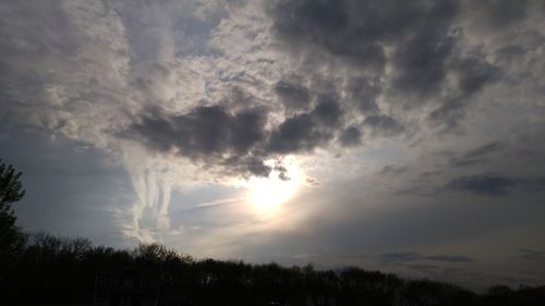 Low angle view of cloudy sky at sunset