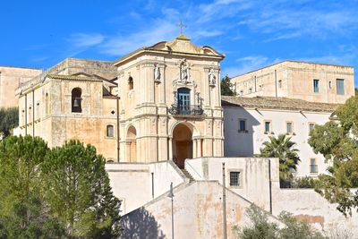 Low angle view of historic building against sky