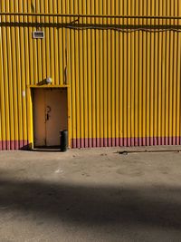 Yellow closed door of building