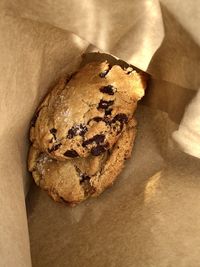 High angle view of cookies on paper