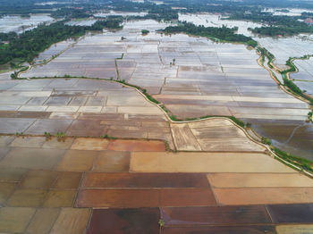 High angle view of cobblestone street by lake