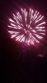 Low angle view of firework display