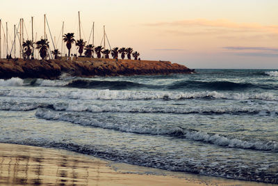 Scenic view of sea against sky during sunset