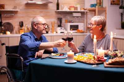 Portrait of senior man preparing food at home