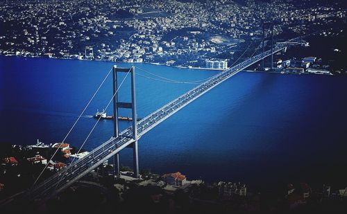 Illuminated bridge at night