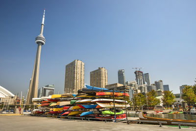 View of buildings in city against clear sky