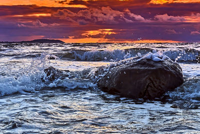 Scenic view of sea against sky during sunset