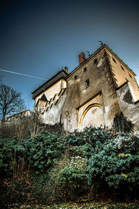 Low angle view of old building against sky