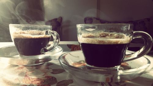 Close-up of coffee served on table