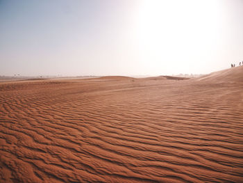 Scenic view of desert against clear sky
