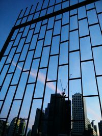Low angle view of modern building against sky