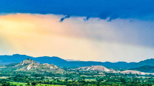 Scenic view of mountains against sky