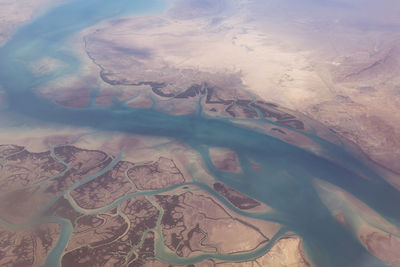 High angle view of sea seen through airplane window