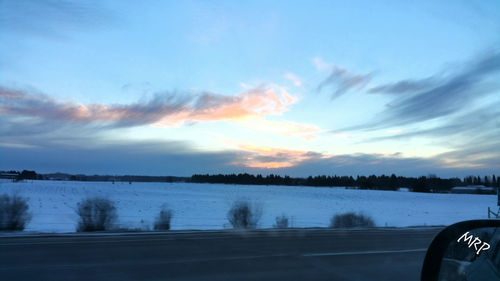 Scenic view of sea against sky at sunset