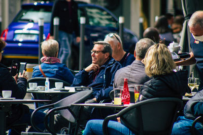 Group of people at outdoor cafe