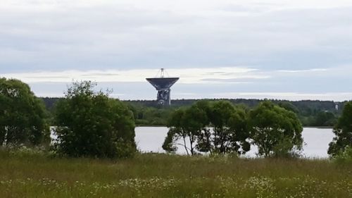 Scenic view of landscape against cloudy sky