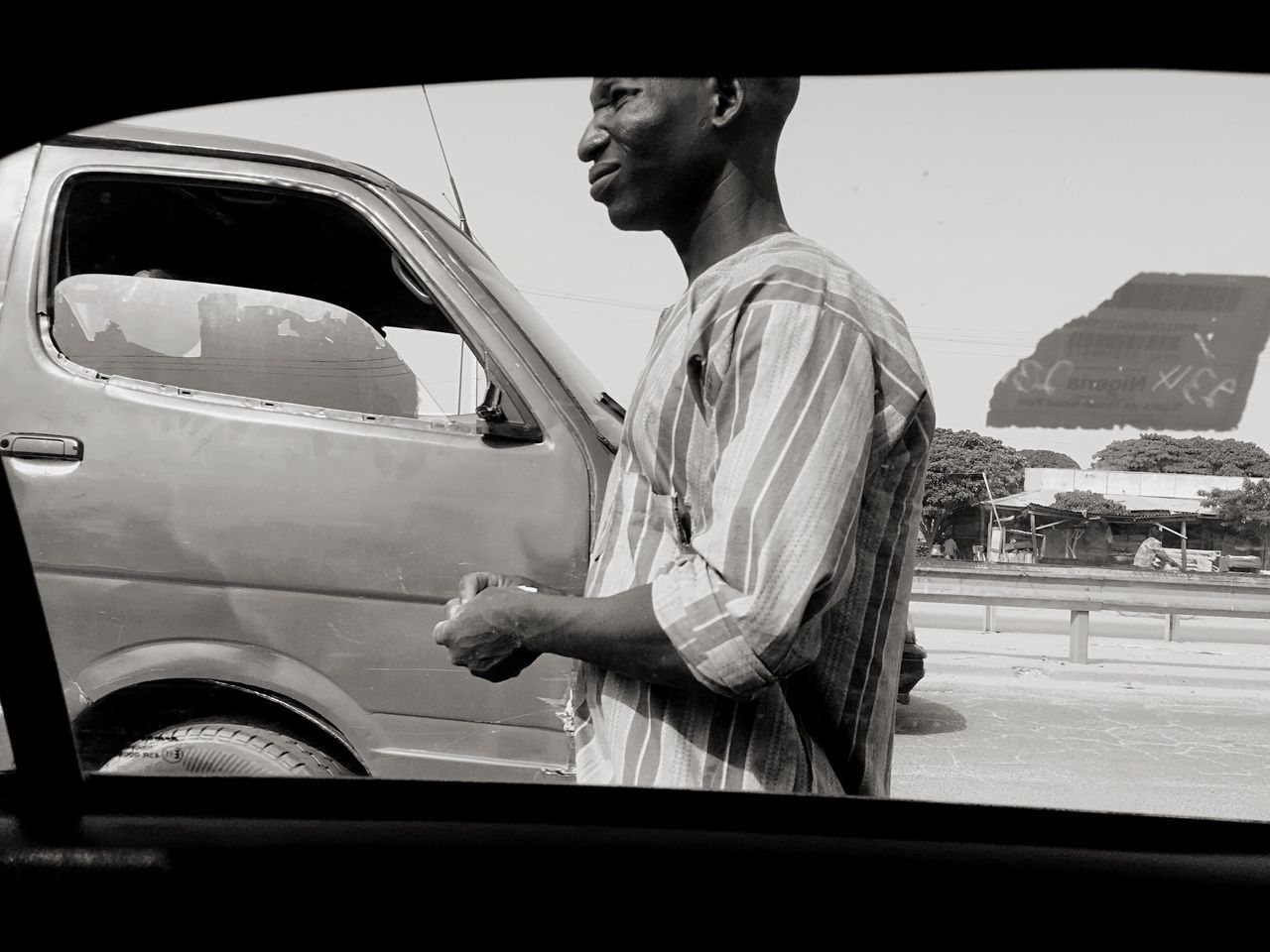 car, transportation, land vehicle, mode of transport, real people, one person, side view, standing, day, outdoors, lifestyles, stationary, men, young adult, cleaning, car wash, human hand, sky, people