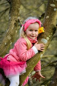 Portrait of girl playing outdoors