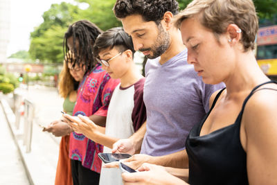 Group of people on mobile phone