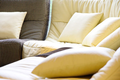 Close-up of sofa on bed at home