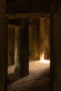 Inside of stone temple lit by sunlight