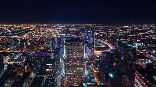 High angle view of illuminated cityscape at night