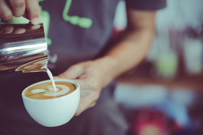 Midsection of coffee cup