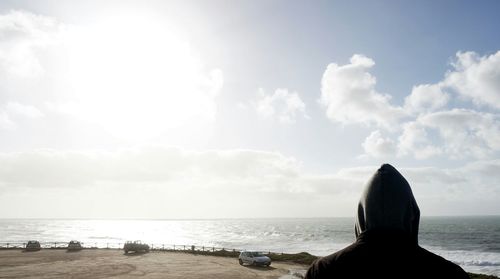 Scenic view of sea against cloudy sky
