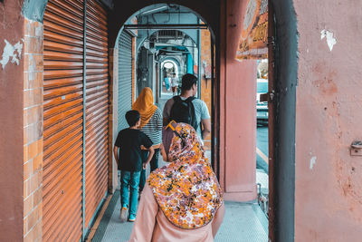 People walking in corridor