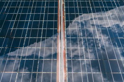 Full frame shot of solar panels with reflection