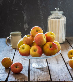 Set for making apple pie. fresh apples in a glass vase