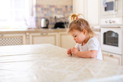 Cute baby girl at home