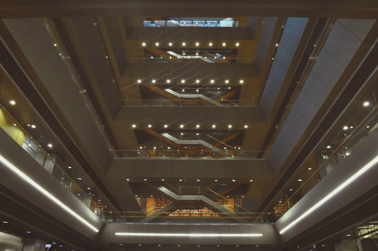 LOW ANGLE VIEW OF ILLUMINATED BUILDING