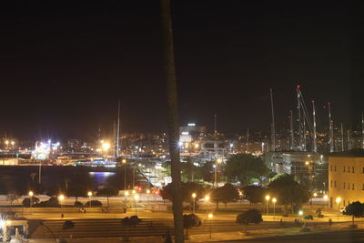 Illuminated city buildings at night