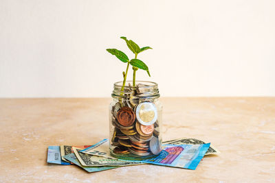 Close-up of glass jar on table