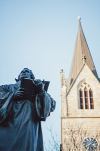 Low angle view of statue against clear sky