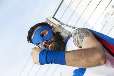 Young hipster superhero fights evil