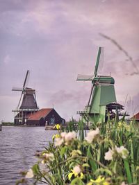 Traditional windmill against sky